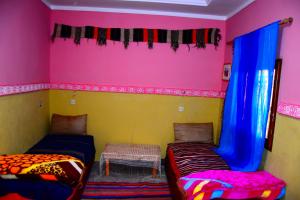 Giường trong phòng chung tại Gîte Tamsoulte