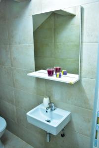 Vannituba majutusasutuses Apartmani Tajna