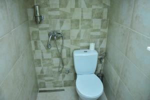 Vannituba majutusasutuses Apartmani Tajna