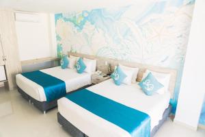 Sea Colors Hotel客房内的一张或多张床位