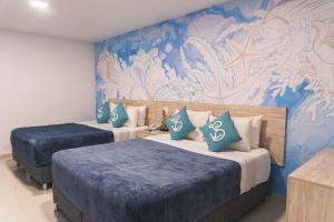Sea Colors Hotel客房内的一张或多张床位