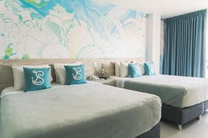 Sea Colors Hotel客房内的一张或多张床位