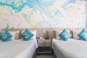 Sea Colors Hotel客房内的一张或多张床位