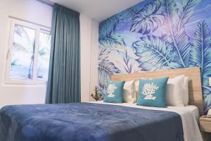 Sea Colors Hotel客房内的一张或多张床位