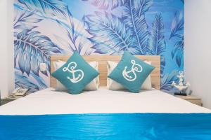 Sea Colors Hotel客房内的一张或多张床位