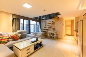 Area soggiorno di Keluowei International Serviced Apartment Guangzhou Sun-yet.memorial Branch