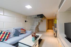 TV o dispositivi per l'intrattenimento presso Keluowei International Serviced Apartment Guangzhou Sun-yet.memorial Branch