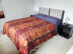 Кровать или кровати в номере Alison's Rest