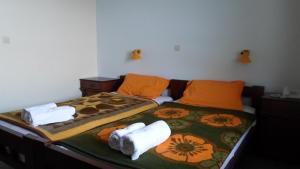 Ένα ή περισσότερα κρεβάτια σε δωμάτιο στο Kouros 