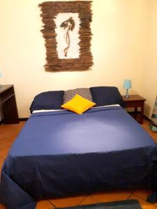 Cama o camas de una habitación en Maison d'une chambre avec terrasse amenagee et wifi a La Trinite