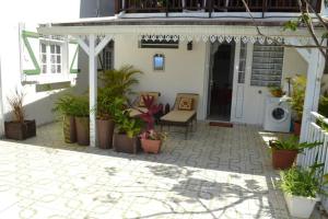 Balkón nebo terasa v ubytování "Studio charmant à Deshaies avec piscine partagée, 20 m²"
