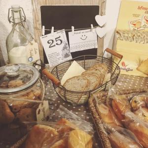 a basket filled with bread and other food items at Albergo Bel Soggiorno in Fiumalbo