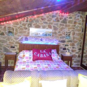 Tempat tidur dalam kamar di Studio with enclosed garden and wifi at Valencia de Alcantara