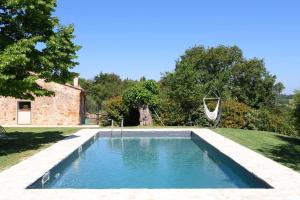The swimming pool at or close to Charming House in Trequanda with Shared Pool