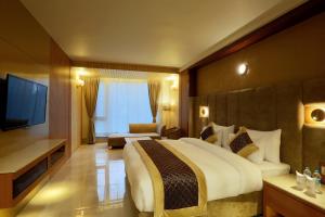 Imagem da galeria de Hotel Omega - Gurgaon Central, Sec 45 em Gurgaon
