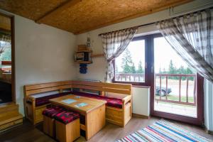 Posezení v ubytování Apartments and Rooms Planinska Idila