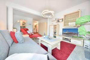 TV a/nebo společenská místnost v ubytování Villa Marfa Wohnung 13