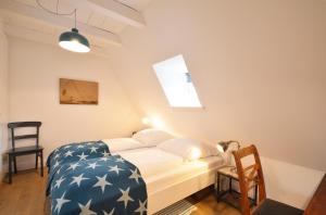 Tempat tidur dalam kamar di Reethus Doerpsend Haus 1