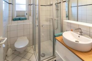 Koupelna v ubytování Haus am Siel