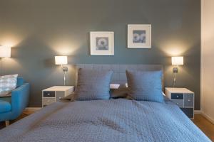 Ένα ή περισσότερα κρεβάτια σε δωμάτιο στο Hafenquartier 54°