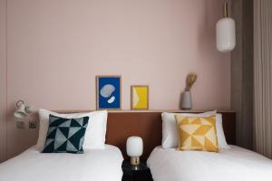 Cama ou camas em um quarto em Zanzibar Locke