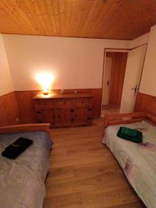 Postel nebo postele na pokoji v ubytování Appartement Daria