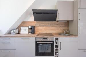 Η κουζίνα ή μικρή κουζίνα στο Appartment am Torhaus +6 φωτογραφίες