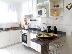 Virtuvė arba virtuvėlė apgyvendinimo įstaigoje Cobertura maravihosa