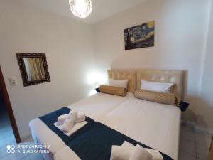 Postel nebo postele na pokoji v ubytování Annas apartment 2 (AgiosNikolaos)