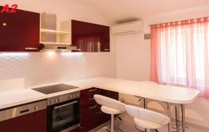 Kuchyň nebo kuchyňský kout v ubytování Apartments Mare + 19 fotografií