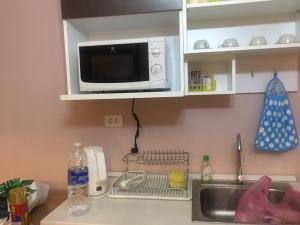 Η κουζίνα ή μικρή κουζίνα στο Bluroc Hua Hin Apartment