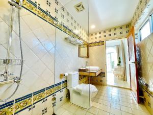 Koupelna v ubytování SpoonDrift Hostal Kenting + 37 fotografií
