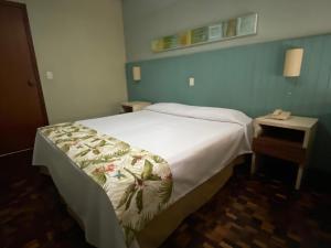 Postel nebo postele na pokoji v ubytování Hotel Pax