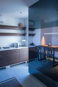 Kuchyň nebo kuchyňský kout v ubytování Korpa Deli Rooms SPA