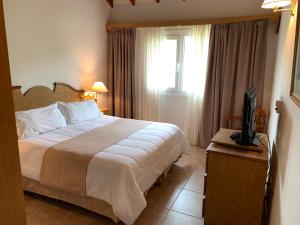 Кровать или кровати в номере Hotel Soleado