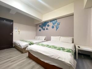 Llit o llits en una habitació de 梧桐樹