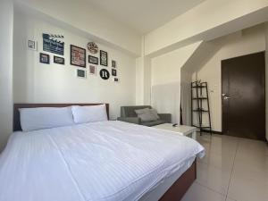 Llit o llits en una habitació de 梧桐樹