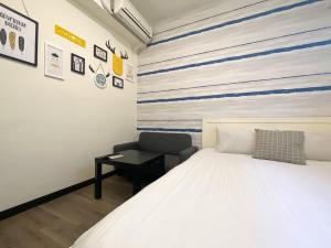 Llit o llits en una habitació de 梧桐樹