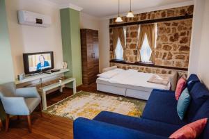 Postel nebo postele na pokoji v ubytování The Suite Apart Hotel