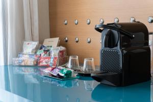 Set per la preparazione di tè e caffè presso Quality Faria Lima