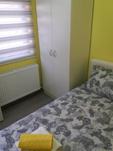 Postel nebo postele na pokoji v ubytování Apartmani SAN
