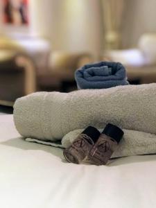 Postel nebo postele na pokoji v ubytování Urban Boutique Hotel