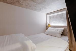 Letto o letti in una camera di Prince Hotel