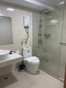 Ванная комната в Palmeraiebeach Resort Rayong ปาล์มมาลี บีช รีสอร์ท ระยอง 罗勇棕榈树海滩酒店