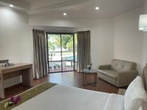Posezení v ubytování Palmeraiebeach Resort Rayong ปาล์มมาลี บีช รีสอร์ท ระยอง 罗勇棕榈树海滩酒店