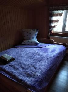 เตียงในห้องที่ Говерлянка