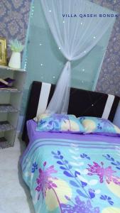 Voodi või voodid majutusasutuse Villa Qaseh Bonda toas