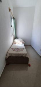 Cama o camas de una habitación en Casa a 1 cuadra de la playa en Punta del Este