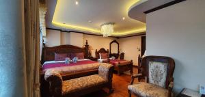 Giường trong phòng chung tại Thanyawintra Boutique and Spa