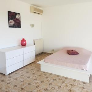 Postel nebo postele na pokoji v ubytování U Riniccio + 6 fotografií